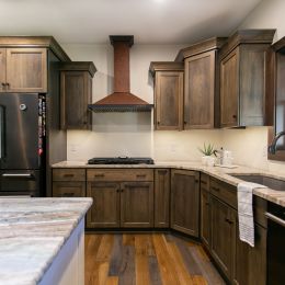 Custom Cabinets with Granite Counter Tops and Copper Stove Hood