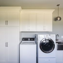 Laundry room with custom cabinets 