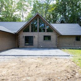 Log Home Stained with PermaChink's Ultra-2 Stone Gray