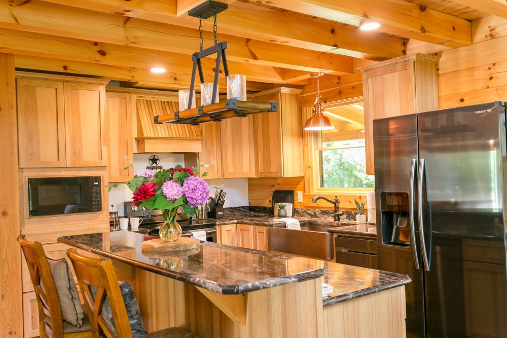 Log Home Kitchen with Center Multi-Level Island 