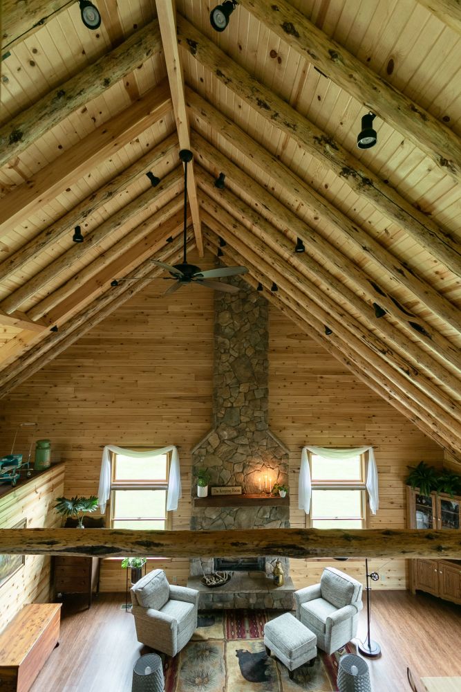 Insulated Log Roof System with Round Rustic Log Rafters