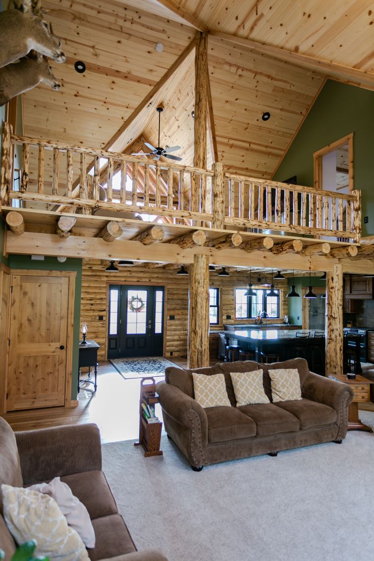 View of the Loft from the Great Room with Rustic Log Railings