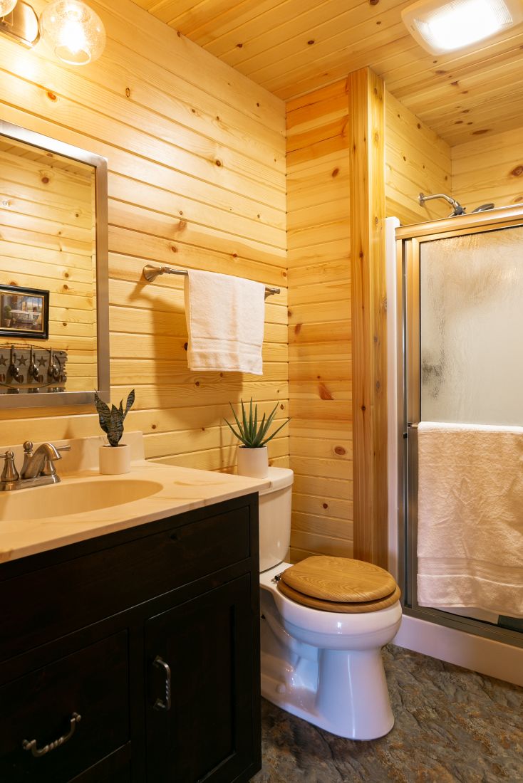 Full Guest Bathroom with barn siding on the walls