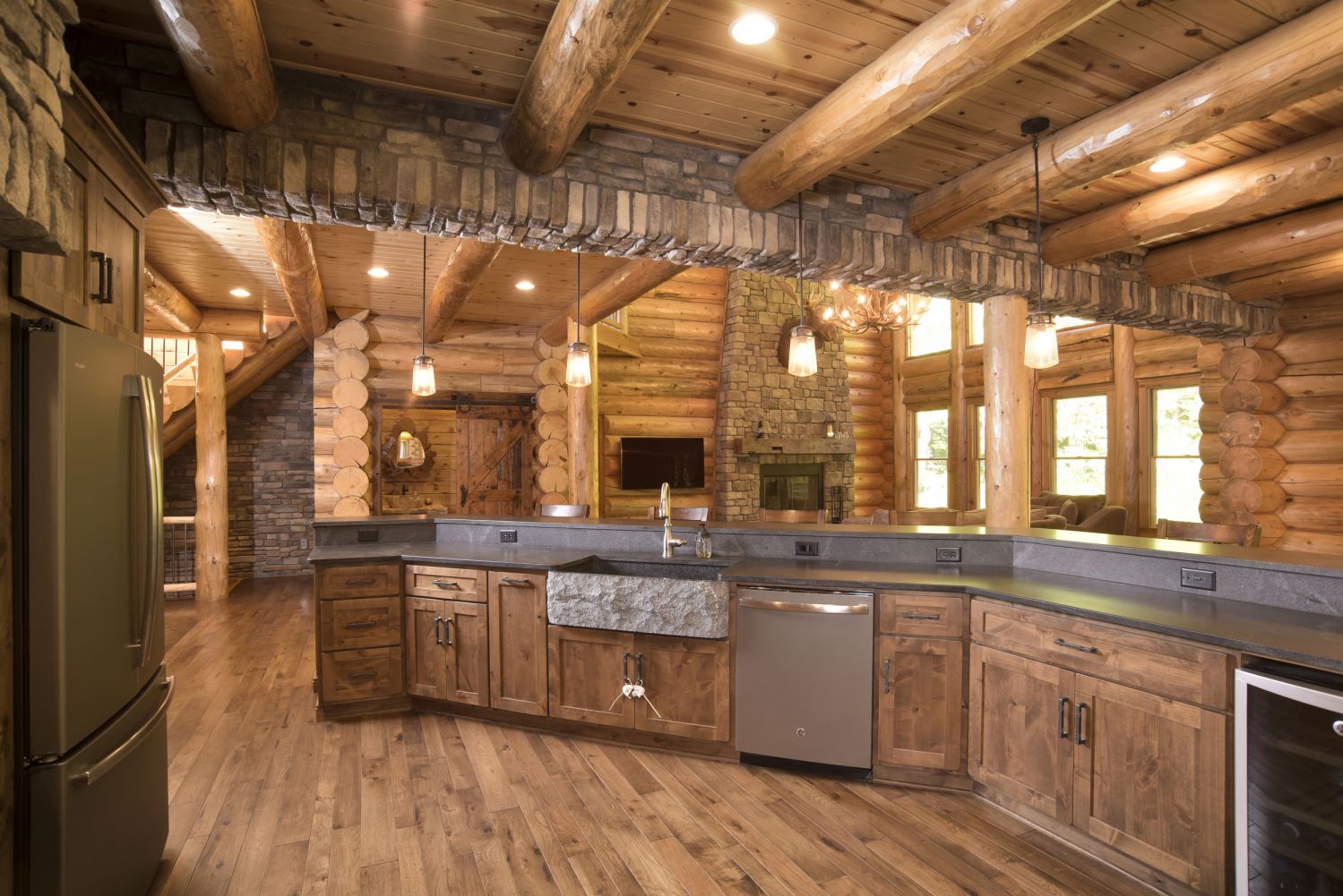 Custom Log Home Kitchen with Raised Bar Seating